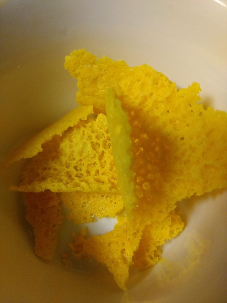 This image has an empty alt attribute; its file name is cheese-shell-broken-768x1024.jpg